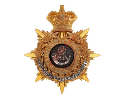 The Durham Light Infantry Victorian Officer's helmet plate circa 1818-1901.A gilt example. Crowned star mounted with laurel w