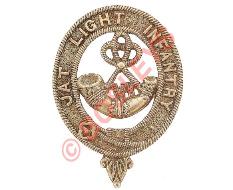 Indian Army. 6th Jat Light Infantry head-dress badge circa 1903-22.A well cast white metal example. Rope edged oval strap 'Ja