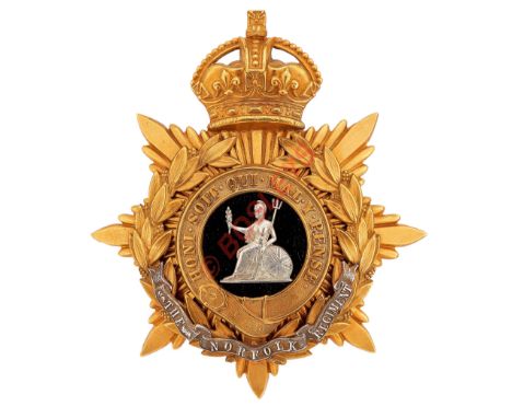 Norfolk Regiment Officer's helmet plate circa 1901-14.A good scarce gilt example. Crowned star mounted with laurel wreath and