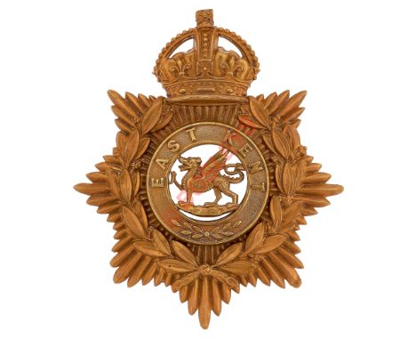 The Buffs (East Kent Regiment) OR's helmet plate.A good post 1902 die-stamped brass example of crowned star bearing laurel wr