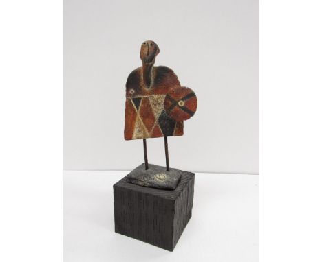 JOHN MALTBY (b.1936) (ARR): A ceramic sculptural figure of a warrior with shield, monogram to ceramic base set on black paint