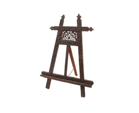 An Edwardian Anglo-Indian carved easel.  62cm tall x 44cm wide