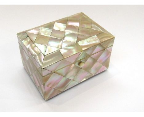 A Victorian mother of pearl veneered single compartment small tea caddy with brass feet 7cm x 11cm x 7.5cm 