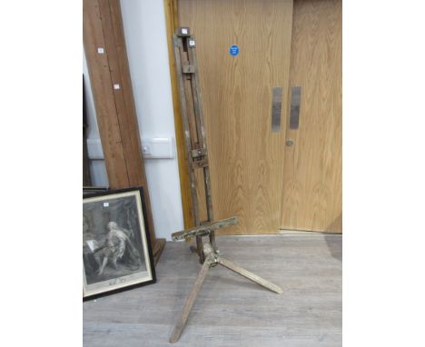 An early to mid 20th Century free-standing artist's easel, tripod base.  173cm tall