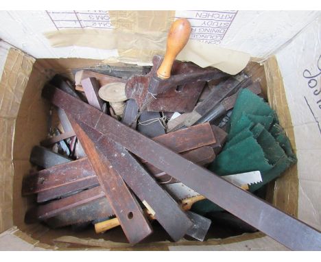 A box of mixed tools, markers, punches, etc
