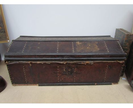 An 18th Century hide covered trunk with brass stud detail.  40cm x 102cm x 52cm
