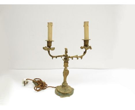 A cast brass two branch electric table lamp in the French rococo style 