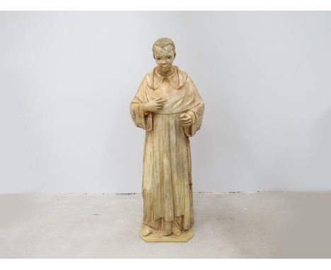 A plaster free standing figure of St Martin De Porres a freed slave from Pandama of African descent. He joined the Dominican 