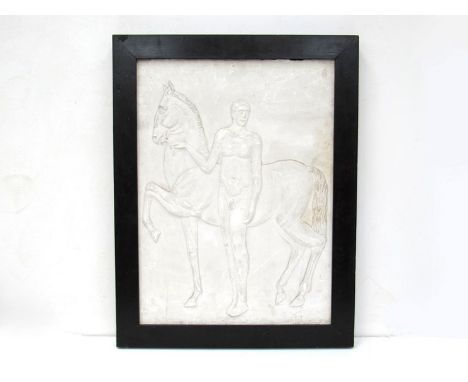 A 20th Century moulded plaster relief panel of a Greek standing beside a horse, 66.5cm x 49cm, in ebonised frame 