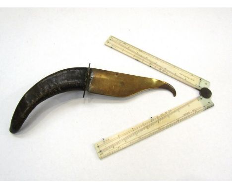 A brass letter opener with horn handle and a Stanley of London ivory folding rule named "H.O. Blackhall" (2)