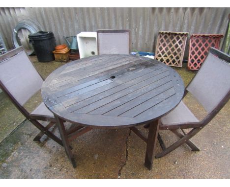 Hardwood gate leg garden table and 4 chairs  one chair needs a small repair 