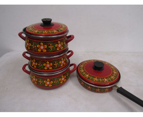 Vintage French painted enamel saucepan set
