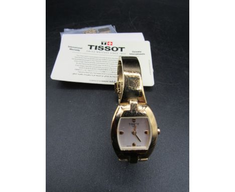 Ladies Tissot watch with card and spare links