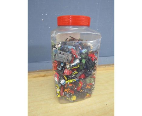 Collection of vintage Micro Machines in plastic jar&nbsp;