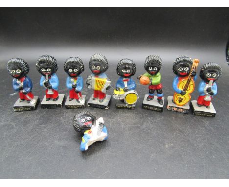 Robertson's musician figures  x 8 and 1 broken  These items are listed on the basis they are illustrative of a bygone culture