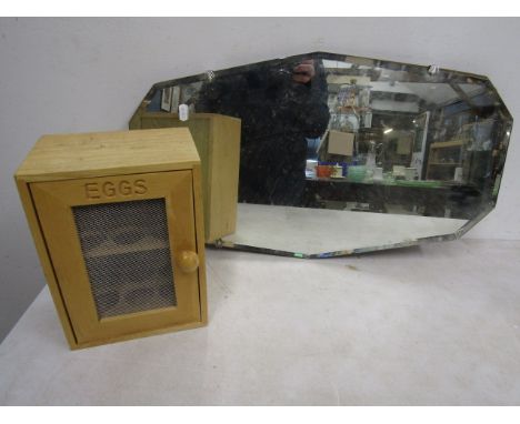 A vintage mirror and egg box