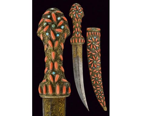 dating: 19th Century provenance: Persia, Curved, double-edged blade with central groove, the base with Arabic inscriptions an