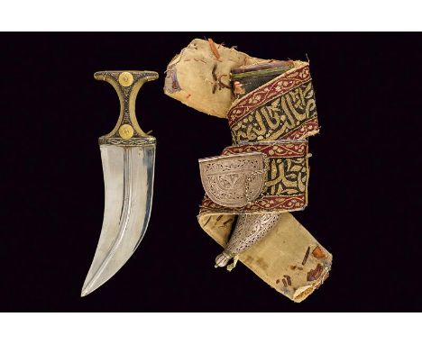 dating: circa 1900 provenance: Yemen, Very wide, curved, double-edged blade with central raiser; horn 'T'-grip with silver an