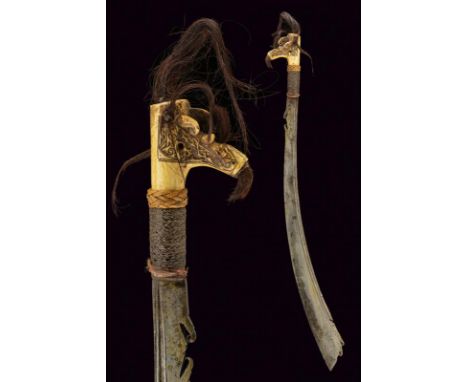 dating: 19th Century provenance: Borneo, Curved, single-and short false-edged blade, with thin fuller next to the back, with 