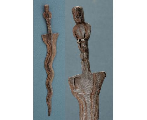 dating: 13th Century provenance: Bali, Undulated, double-edged blade in pamor, in one piece with anthropomorphic grip. Togete
