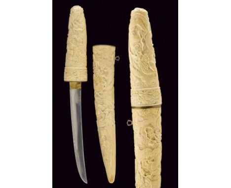 dating: early 20th Century provenance: Japan, Slightly curved, single-edged blade, signed base, brass habaki. Ivory grip and 