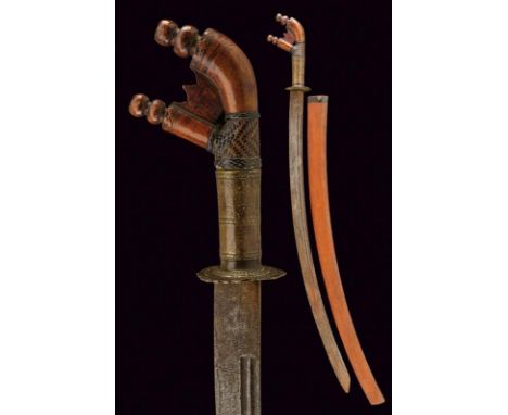 dating: 19th Century provenance: Kalimantan, Long, curved, single-and false-edged blade, tip, in pamor, with double fuller, e