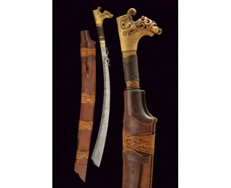 dating: End of 19th beginning of 20th Century provenance: Borneo, Curved, single-edged blade, enlarged at the foible, with gr