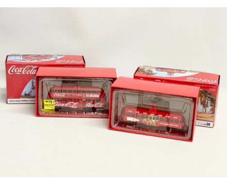 2 Corgi Coca Cola models in boxes. Coca-Cola Double Decker Tram, 1:76 die cast model. Coca-Cola Single Decker Tram, 1:76 die 