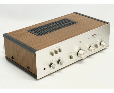 A vintage Rotel Integrated Stereo Amplifier. Model RA-214. 
