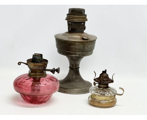 A Victorian Ruby Glass lamp bowl, an Edwardian finger lamp and other. 