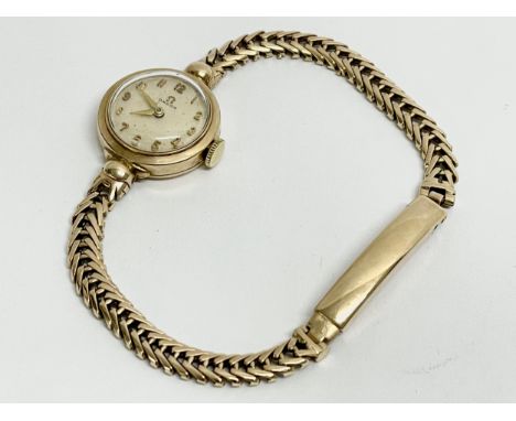 A vintage 9ct gold ladies Omega cocktail watch. 