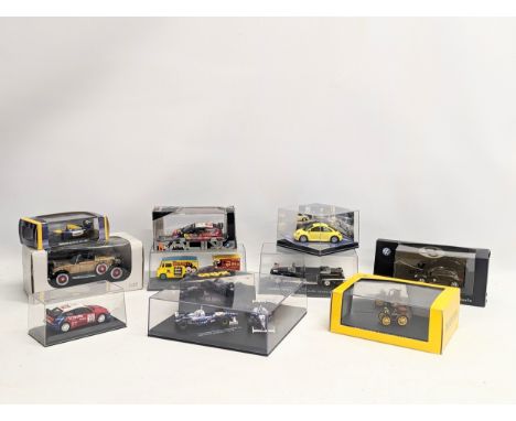 A collection of model cars, etc 