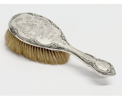 A silver hair brush. Birmingham, 1907. 25cm 