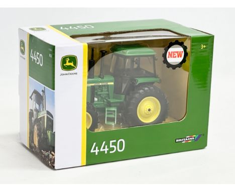 An unused Britains John Deere 4450 tractor in box. 20x11x14cm 