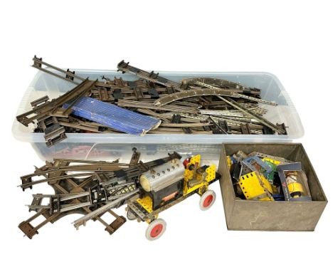 A large quantity of vintage Hornby train tracks and Meccano. 