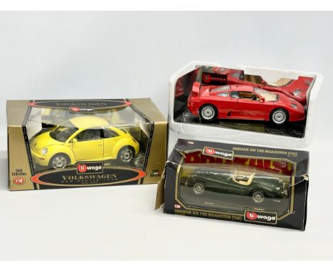 3 large Burago model cars in boxes. A Gold Collection Burago Volkswagen New Beatle 1998, 1/18 scale 30x18.5x12.5cm. A Burago 