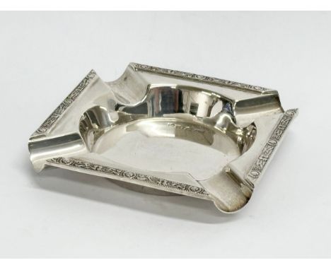 An ornate silver ashtray. Sheffield, 1931. 96 grams. 9x9cm 