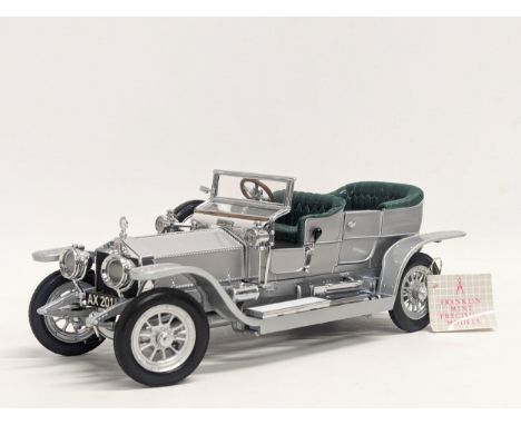 A 1986 Franklin Mint Precision Model of 'The 1907 Rolls-Royce Silver Ghost.' 20cm 