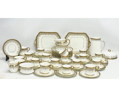 A good quality 72 piece early 20th century Cauldon LTD gilt porcelain tea service. 