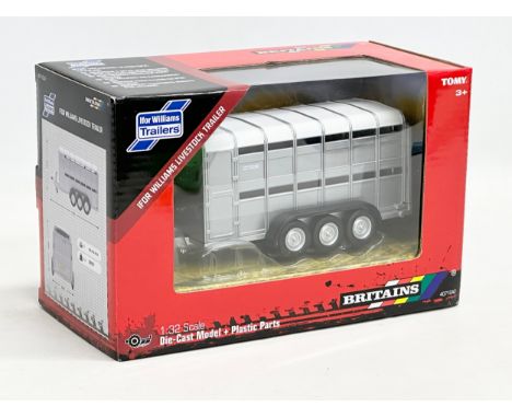 An unused Britains Ifor Williams Livestock Trailer in box. Die-Cast Model and Plastic Parts 22x11x14cm 