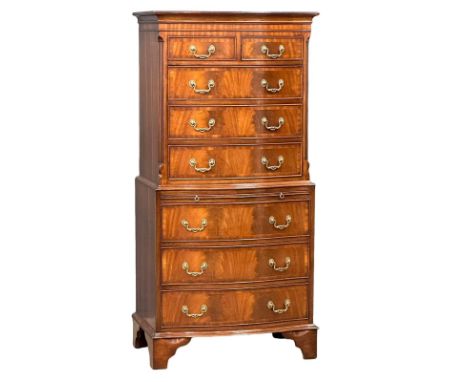A vintage George III style mahogany serpentine front tallboy chest of drawers with brushing slide and bracket feet. 72x45x152
