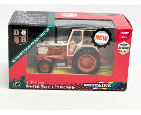 An unused Britains Weathered David Brown Tractor in box. 1:32 scale. Die-Cast Model and Plastic Parts. 20x11x11cm 