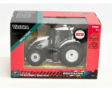 An unused Britains Valtra TZ54V Tractor in box. 1:32 scale. Die-Cast Model and Plastic Parts. 22x12x15cm 