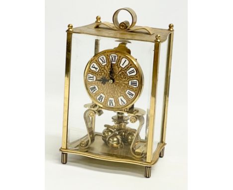 A brass mantle clock with etched bevelled glass panels. Kundo, Kieninger &amp; Obergfell. West Germany. 14x10x22cm 