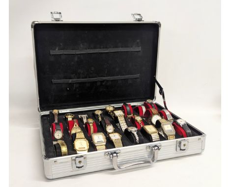 A collection of vintage ladies and gents watches in case 