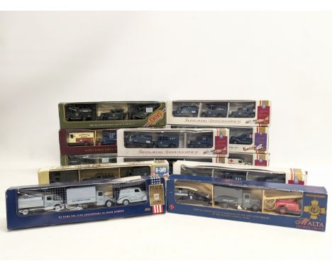 A collection of military Lledo model trucks 