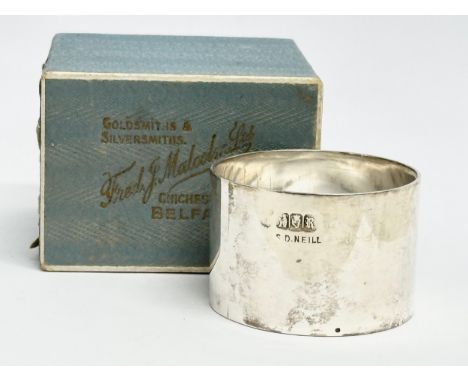 An Irish silver napkin ring with box. Dublin, 1912. 39.2 grams. Stamped S.D. Neill. 