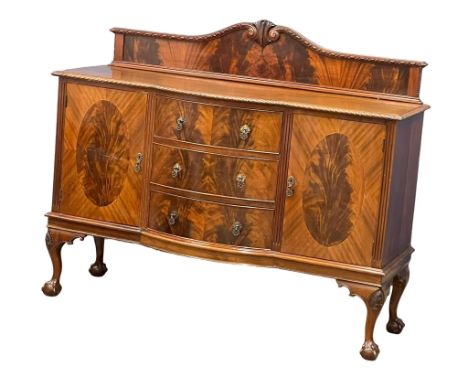 An early 20th century Chippendale Revival mahogany sideboard on Ball &amp; Claw feet. 152x51x127cm 