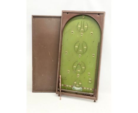 A vintage Corinthian 30 bagatelle game board. 