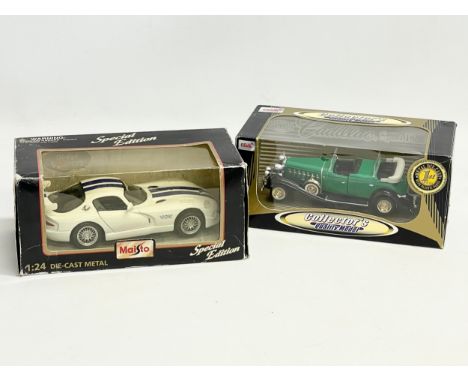 2 model cars out boxes. A Special Edition Maisto Viper GTSR, 1:24 die-cast metal. Collectors Quality Model 